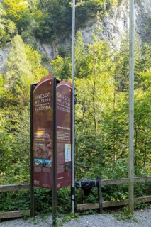 Information board on the Unesco World Heritage Site in the Old Pfäfers Baths in the Tamina Gorge,