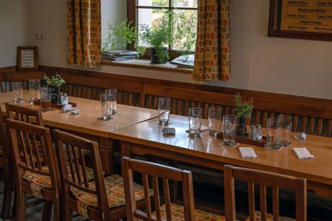 Empty beer glasses and receipts on pub tables, Bavaria, Germany