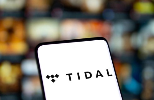 Tidal logo is displayed on smartphone. Tidal is a Norwegian-American music streaming service