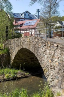 Historic bridge over the Triebisch, in the background the Furkert-Bartsch mill, Miltitz,