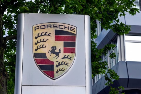 Porsche headquarters at Porscheplatz in Zuffenhausen. Logo of the sports car manufacturer.
