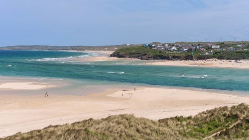 View from Hayle Sands to Hayle Beach and Riviere Towans Beach and some houses. sandy beach beach,