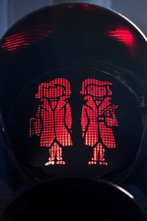 Pedestrian traffic light with red Brothers Grimm Ampelmännchen, Hanau, birthplace of the brothers,