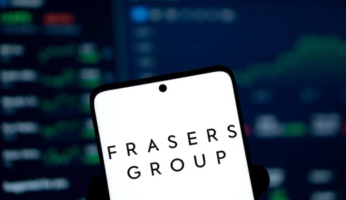 Frasers group logo is displayed on smartphone. Frasers Group plc is a British retail, sport and