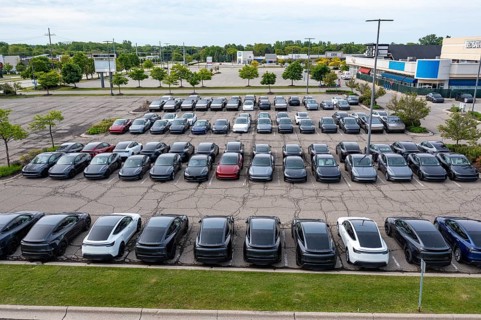 Farmington Hills, Michigan USA - 30 May 2025 - Many dozens of unsold Tesla electric vehicles,