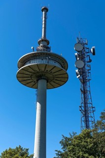 Transmission mast with antennas, telecommunications tower of Deutsche Telekom, transmission tower,