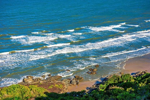 Paradise beach seen from above on the southern coast of Bahia in the city of Serra Grande Serra