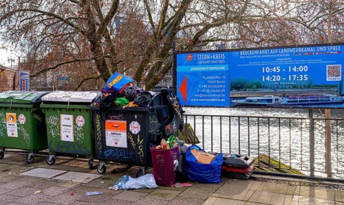 Overfilled rubbish containers, Jannowitzbrücke, Berlin, Germany