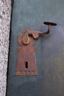 Detailed view of the parish church door of St Laurentius, St Lorenzen, Bolzano, Trentino, South