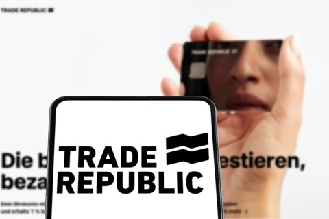 Trade Republic Bank and Neobroker from Germany logo on a mobile phone and website in Stuttgart,