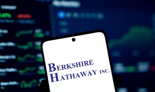 Berkshire Hathaway inc logo is displayed on smartphone. Berkshire Hathaway Inc is an American