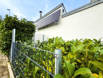 Solar panels on a house wall in Hilden, Germany