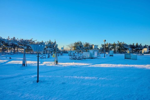 Snow-covered weather station with technological devices, blue sky, winter, Wasserkuppe, Gersfeld,