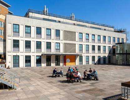 Biomedical Sciences Teaching laboratories building, students eating picnic lunches, University of
