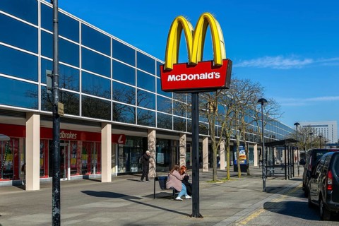 McDonald's sign in Midsummer Place shops, Milton Keynes Central, Buckinghamshire, England, UK