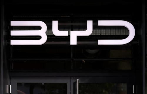 Logo in front of showroom, sales exhibition of the car brand BYD Build Your Dreams, e-vehicles,