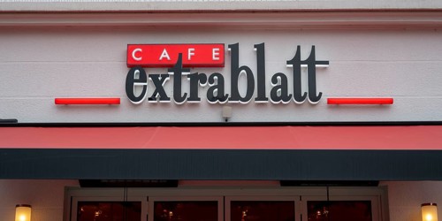 Cafe Extrablatt, lettering and logo on the façade, Soest, North Rhine-Westphalia, Germany
