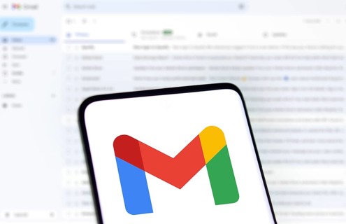 Google Gmail logo is displayed on smartphone