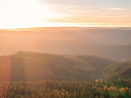 Light play of the sunrise over the wooded hills, quiet expanse, Black Forest, Germany