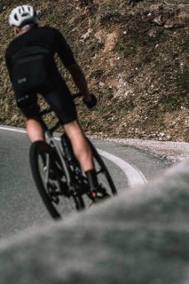 Road bike rider in spring between Lechtal and Tannheimer Tal in front of picturesque scenery of the