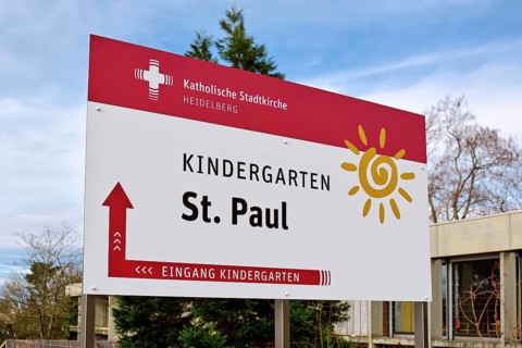 Heidelberg, Germany - February 20th 2025: Sign at entrance of Catholic City Church St. Paul's