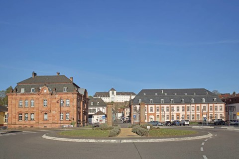 Former royal Bavarian rent office built in 1902 and baroque town hall built in 1775 with view of