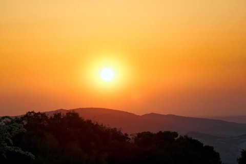 Sunset over mountain range, Sierras Subbeticas Natural Park, near Zuheros, Cordoba province,