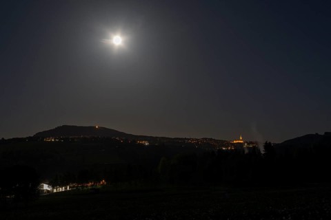 View from north to Pöhlberg and Annaberg-Buchholz with St.-Annen church, full moon night,