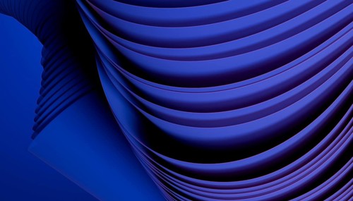 Dynamic abstract 3D image featuring flowing dark blue wave patterns and fluid curves, creating a