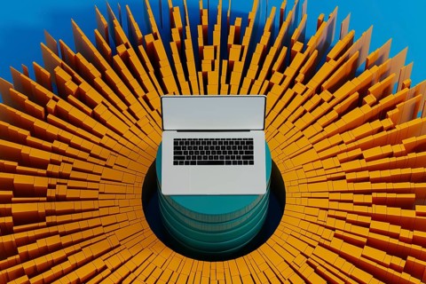 A laptop stands surrounded by vibrant data elements, symbolizing connection and network activity