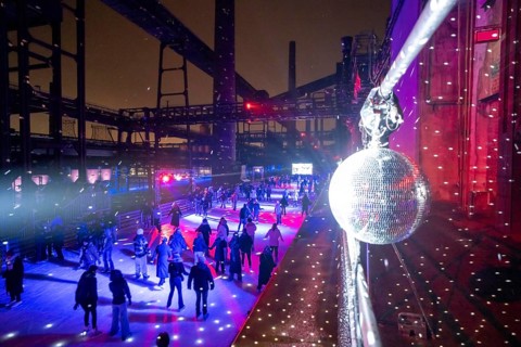 Ice rink at the Zollverein coking plant, ice skating with music and many lighting effects, Essen,