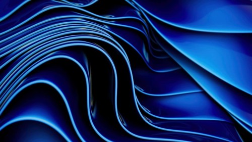 A striking abstract visual of fluid waves in deep blue hues, featuring smooth curves and shiny
