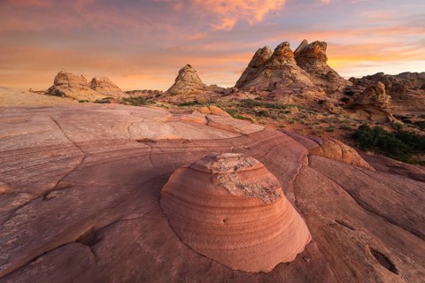 Golden sunset lighting the unique rock formations of Coyote Buttes in the Paria Canyon-Vermilion