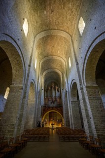 View of the entrance and the organ in the abbey of Gellone, also Saint-Guilhem-le-Désert monastery,