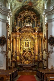 Altar of the baroque parish church Mariahilfer Kirche in Vienna, Austria