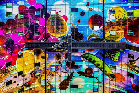 Markthal from 2014, offers over 100 food stalls and delicatessens with spectacular ceiling fresco
