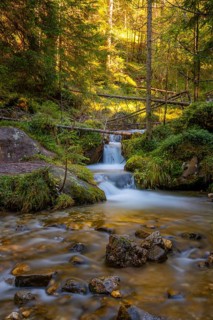 View of a small waterfall of a torrent, Dolomites, Puez-Geisler nature park Park, St. Magdalena,