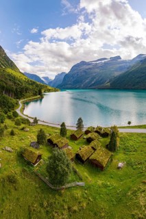 Traditional cabins on the shores of Lake Lovatnet, Breng seter, Loen, Stryn, Norway
