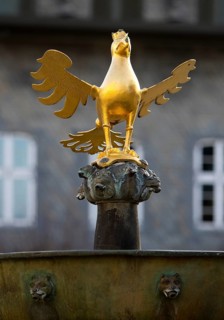 Gilded imperial eagle as a fountain eagle on the market fountain, Old Town, Goslar, UNESCO World