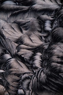 Magnified image showcasing the intricate details of salicylic acid microcrystals, depicted in a