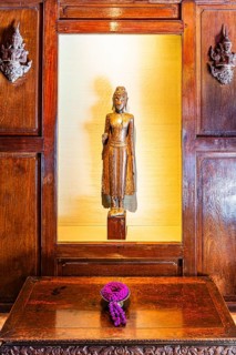Jim Thompson House and Museum, carved wooden wall and carved figures, Bangkok, Thailand's