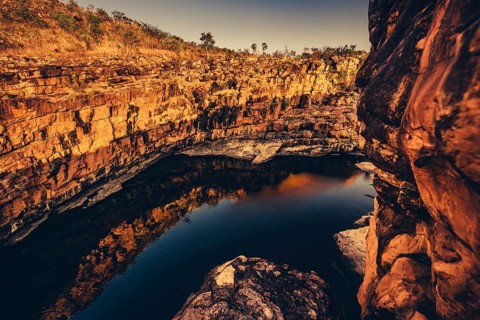 Bell Gorge waterfall, a body of water in north-west Australia in the Kimberley. Sunrise in the