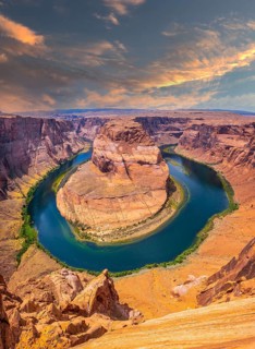 Sunset on Horseshoe Bend and the Colorado River in the background, Arizona. United States
