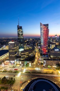 Skyline skyscrapers in the city centre at night in Warsaw, Poland