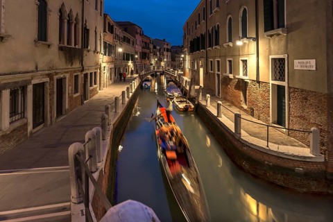 Gondola in the evening in a side canal in the Dorsoduro district, Venice, Veneto, Italy
