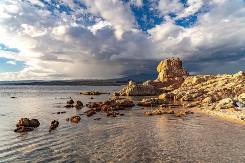 Ruins of a Genoese tower on La Tonnara beach near Bonifacio, Corsica, France