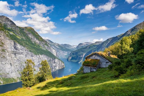Blomberg Gård, historic mountain farm on steep mountainside, Geirangerfjord, near Geiranger, Møre