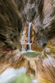 Waterfall with zoom effect Heckenbach waterfall, The dripping eye of nature, Kochel am See,
