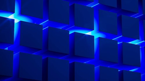 Cube structures create a captivating geometric arrangement highlighted by blue light, showcasing
