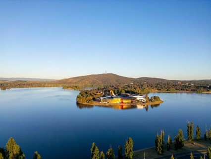 From above, this drone view of Canberra, the capital of Australia, featuring the serene waters of